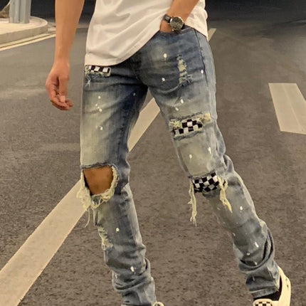 Ripped high street style checkerboard patch denim trousers