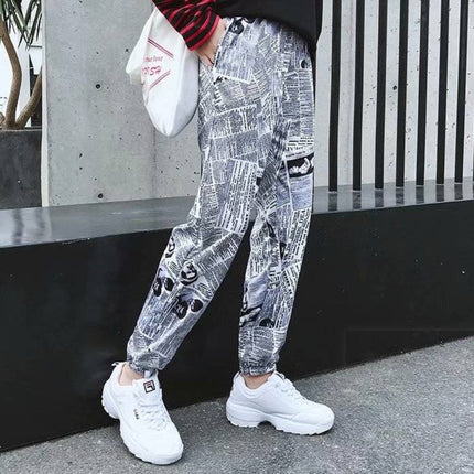 Tide brand hip hop newspaper pants men and women pants ins the same paragraph street loose beam pants national tide