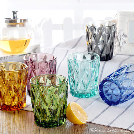 Creative colored relief glass cup on trumpet