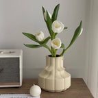 Vase and white tulips