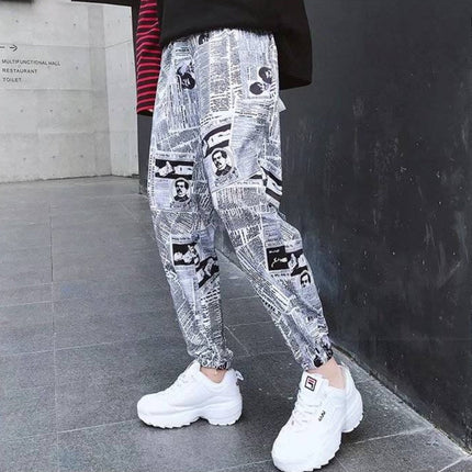 Tide brand hip hop newspaper pants men and women pants ins the same paragraph street loose beam pants national tide