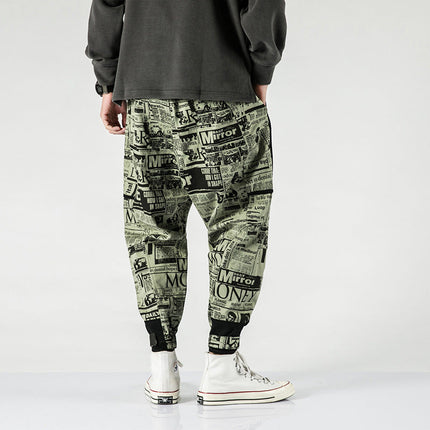 Tide brand hip hop newspaper pants men and women pants ins the same paragraph street loose beam pants national tide