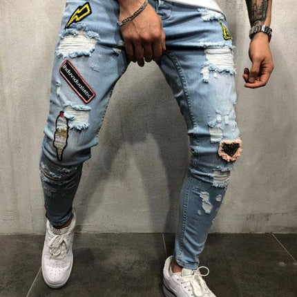 Blue ripped logo jeans